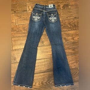 Legend flare jeans with rhinestone pockets